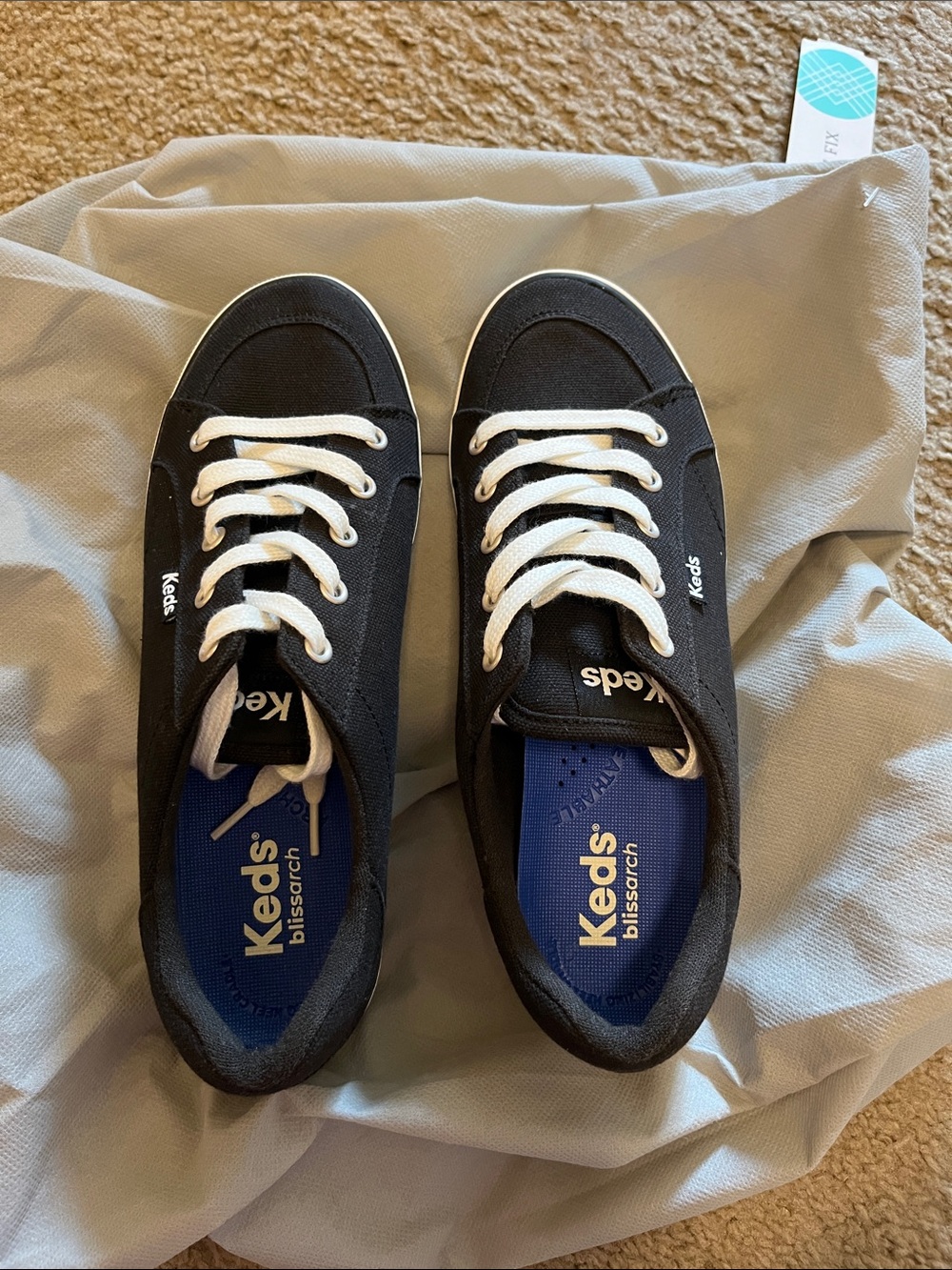 Keds Black Canvas Sneakers with White Laces and Blue Insole